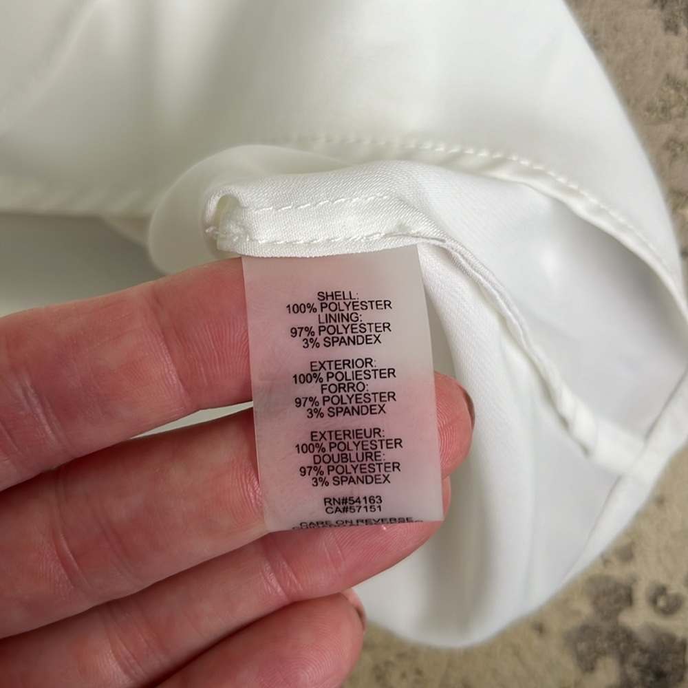 Like new Calvin Klein asymmetrical sleeveless dressy top - Picture 9 of 11